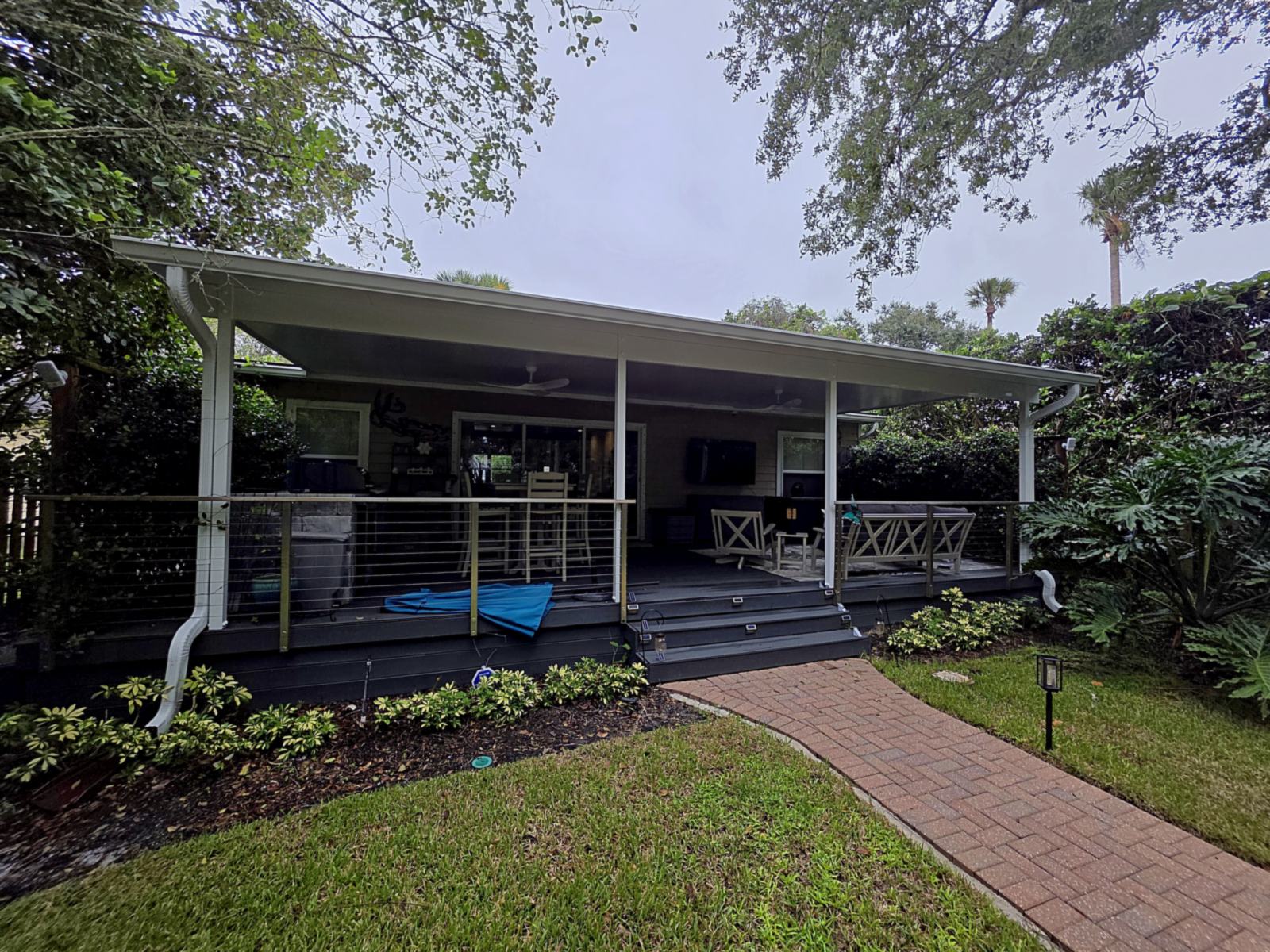 Attached patio cover over a deck, built by Better Home Improvement in Atlantic Beach, FL