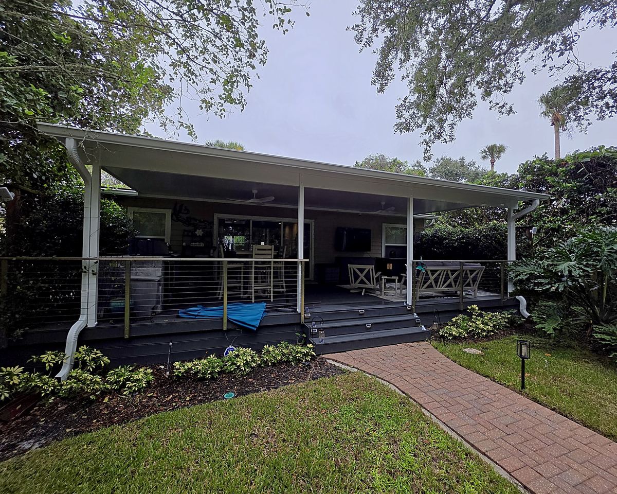 Attached patio cover over a deck, built by Better Home Improvement in Atlantic Beach, FL