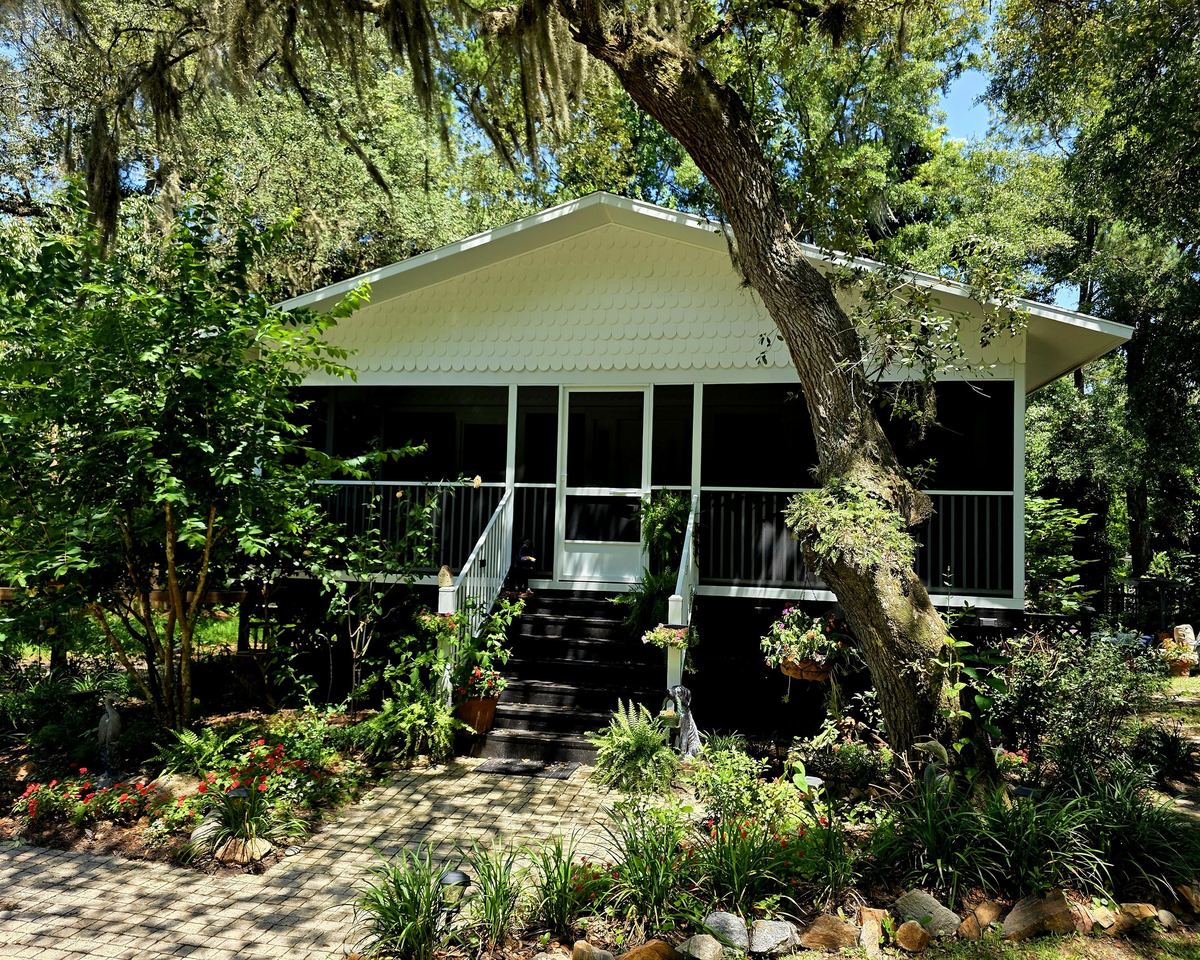 Screen room built by Better Home Improvement on a raised deck in Green Cove Springs, FL