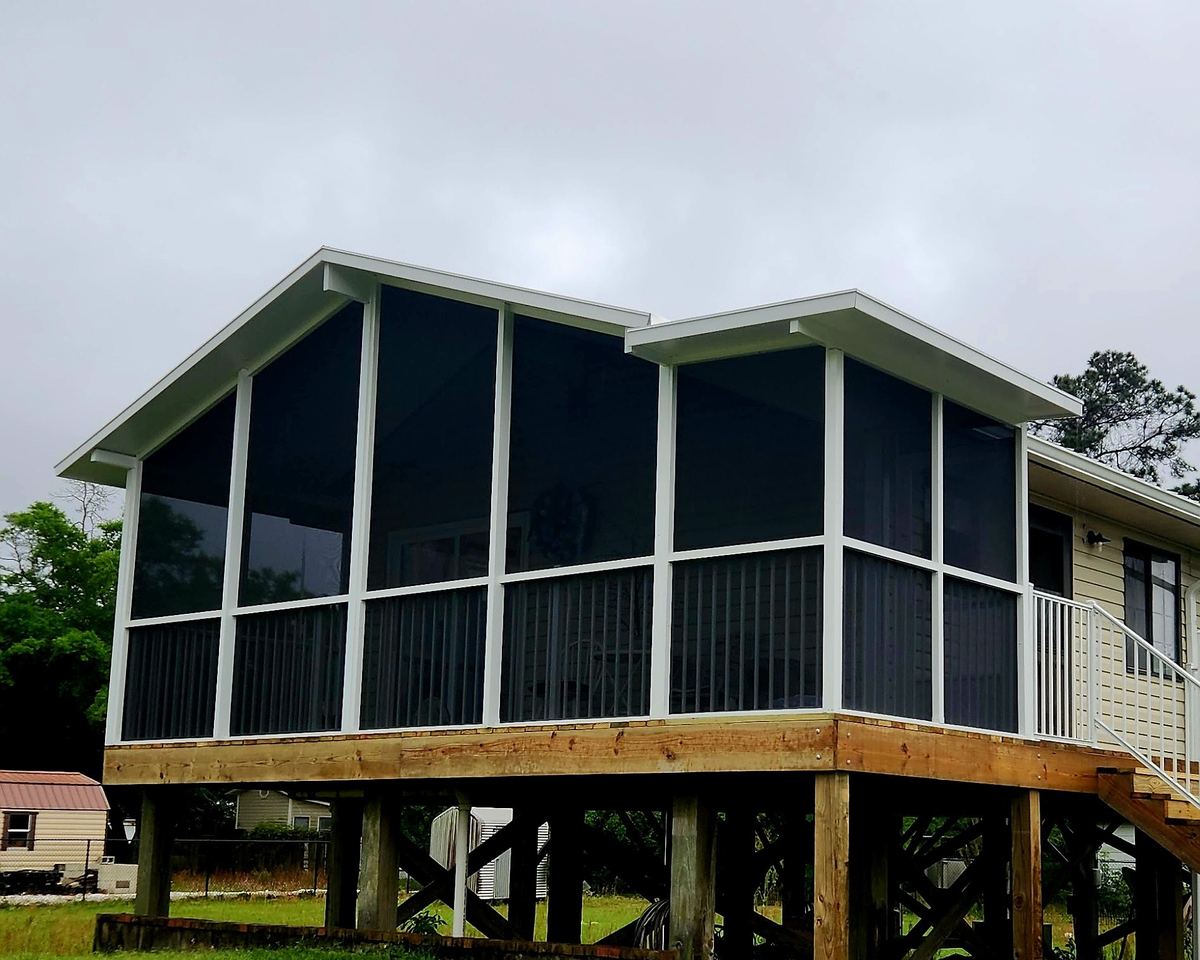 Gable screen room built by Better Home Improvement on a raised deck in Jacksonville, FL