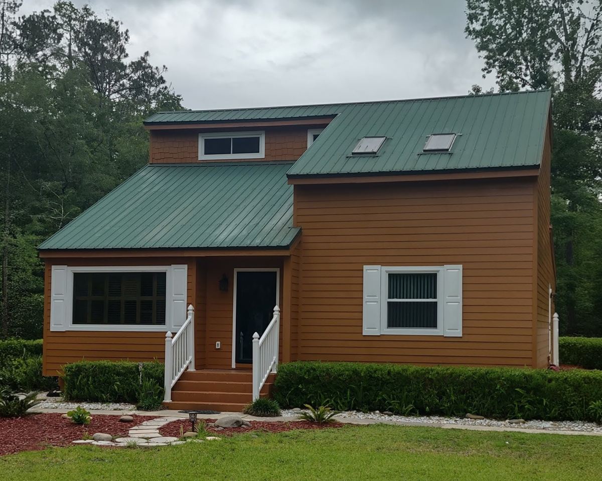 Front of a two-story home with James Hardie lap siding installed by Better Home Improvement in Orange Park, FL