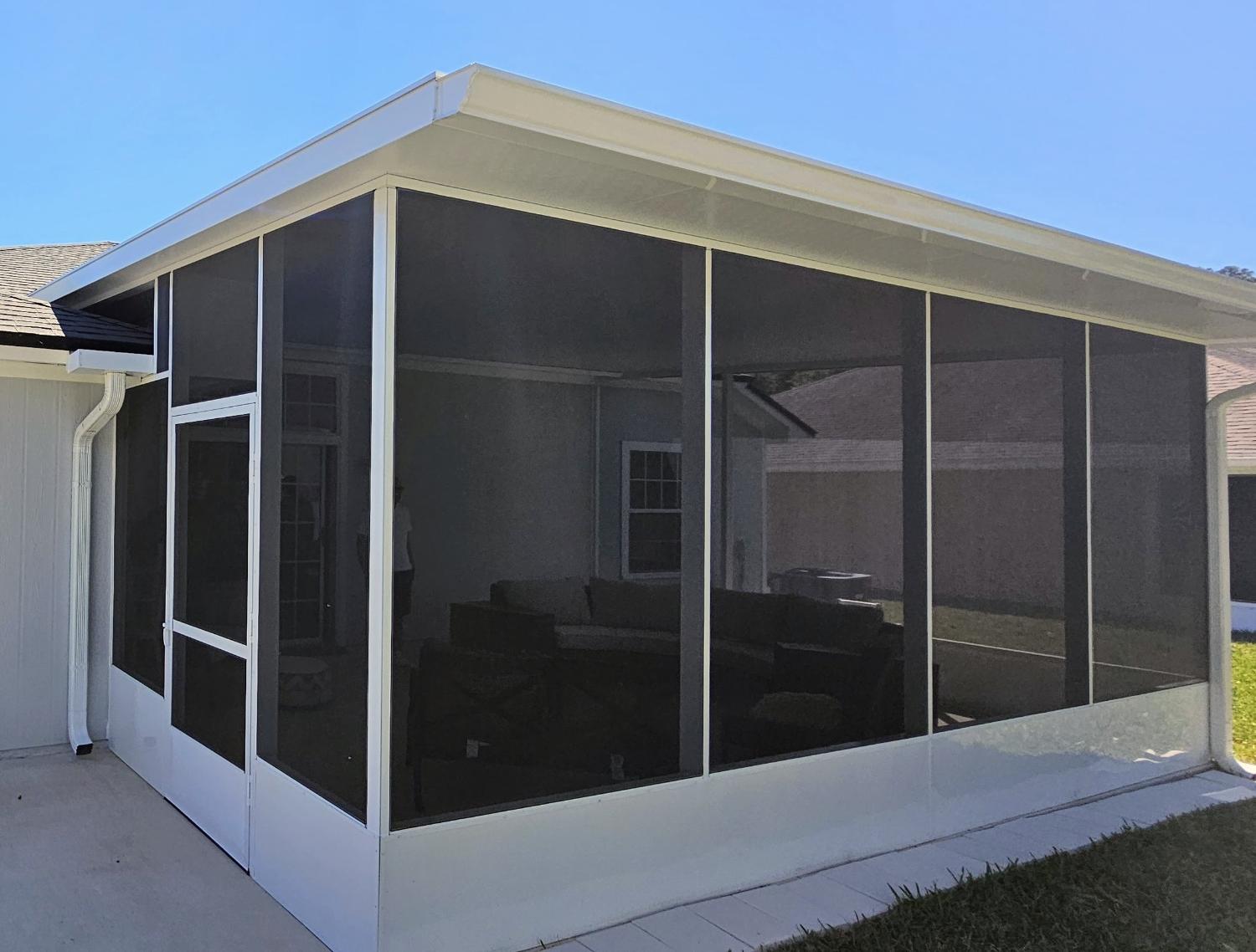 White aluminum patio screen enclosure with kickplates in Orange Park Florida